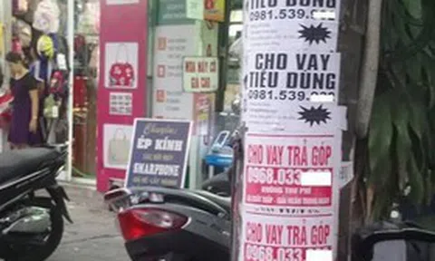 Từ 15/5, dán, vẽ sản phẩm quảng cáo trên cột điện bị phạt đến 20 triệu đồng