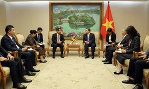 Phó Thủ tướng Thường trực Chính phủ Phạm Gia Túc tiếp Bí thư Thành ủy, Chủ tịch HĐND Thủ đô Vientiane (Lào)